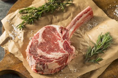 Raw Red Grass Fed Tomahawk Steaks clipart