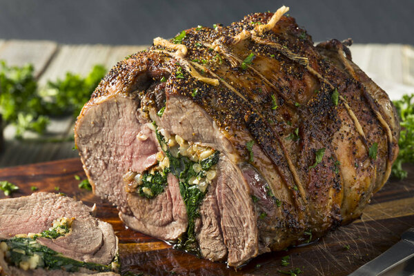 Roasted Stuffed Leg of Lamb with Spinach and Pine Nuts