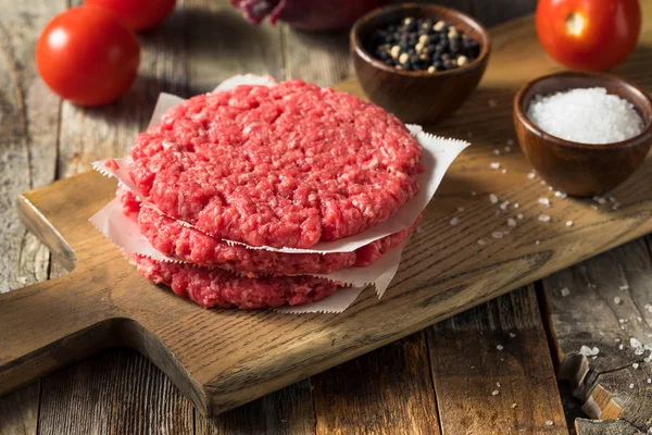 Raw Red Organic Hamuburger Pattys — Stock Photo, Image