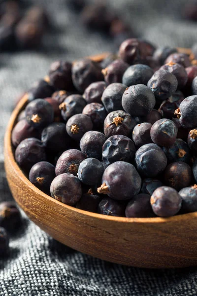 Raw Purple Organic Juniper Berries in a Bowl