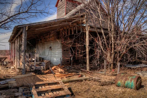 A old neglected Farm and Equipment from the Mid-20th Century in — стоковое фото