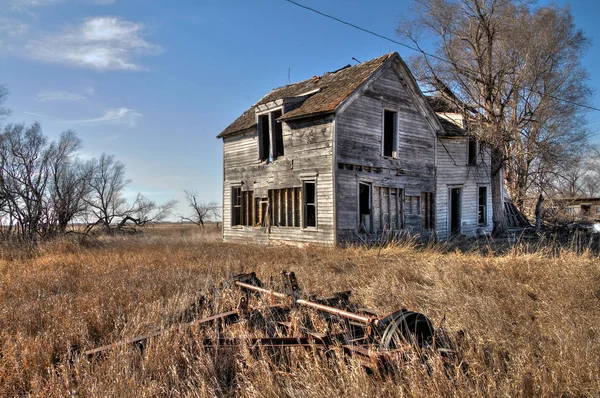 Abandoned Farm Houses in Rural South Dakota slowly decay. Royalty Free Stock Images