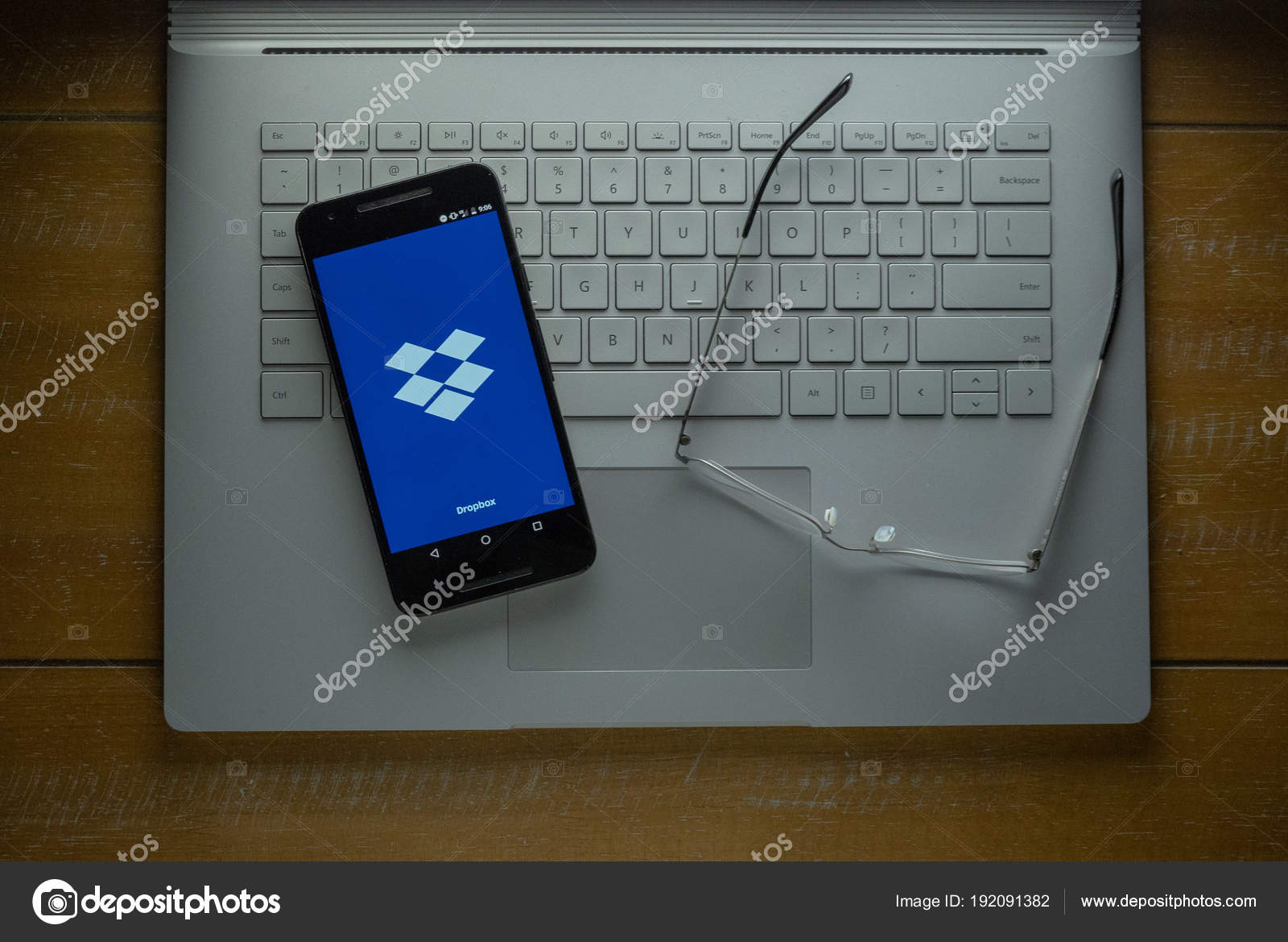 Dropbox App Loading On Android Phone In A Dark Room Stock