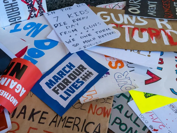 Pile of various discarded signs for the March for Our Lives rall — Stock Photo, Image