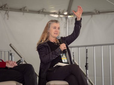 Rebecca Solnit speaking at 2018 Bay Area Book Fest at a panel ab clipart