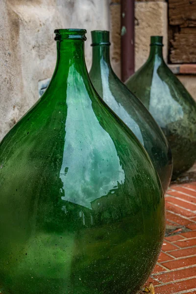 Huge empty old wine jars closeup. Tuscany