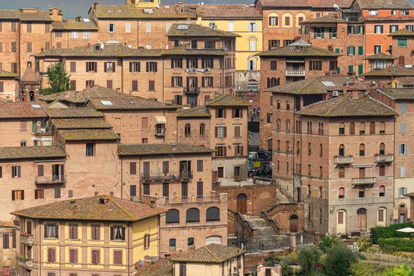 Casas patrón beackground, ciudad medieval de Siena, Italia — Foto de Stock