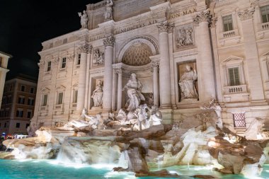 Fountain di Trevi by night - most famous Rome's fountains in the world clipart