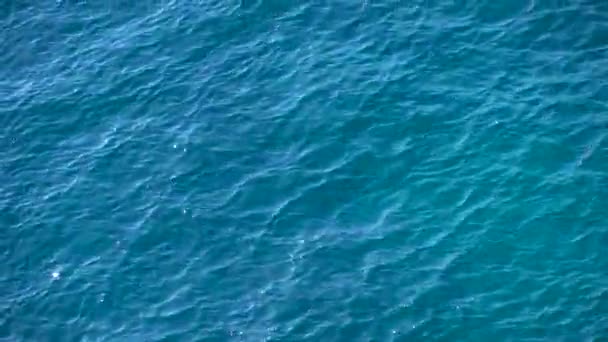 Aerial top down view from high altitude of blue azure turquoise sea water — Stock Video