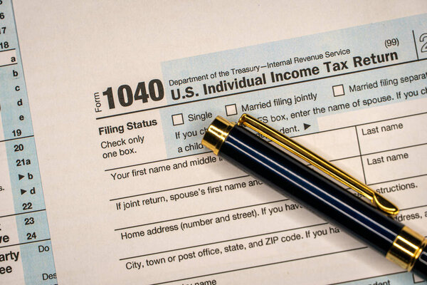 Tax forms 1040. U.S Individual Income Tax Return. Tax time. Background