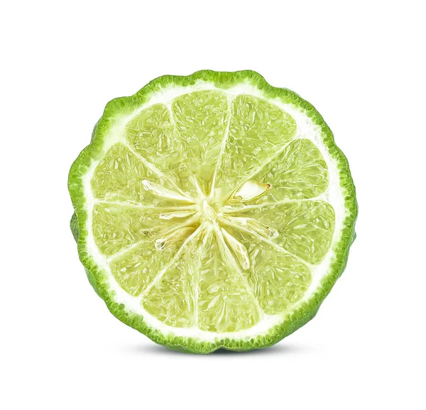 Een helft van bergamot of Kaffir met zaden geïsoleerd op witte backgr — Stockfoto