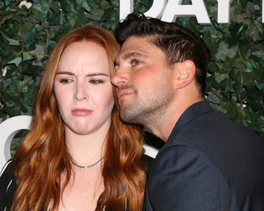 Camryn Grimes, Robert Adamson