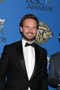  Patrick J. Adams
