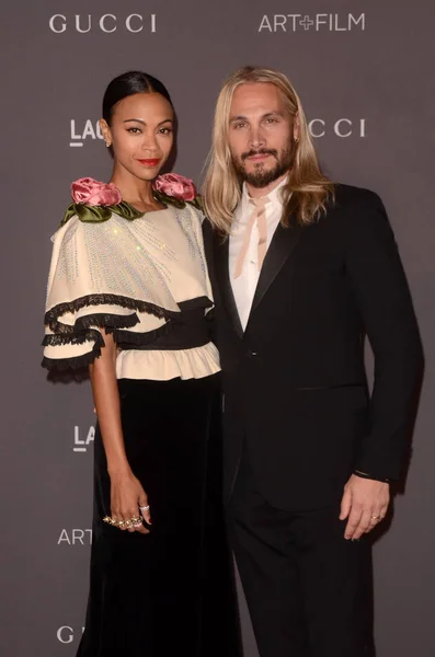 Skådespelerskan Zoe Saldana och konstnären Marco Perego — Stockfoto