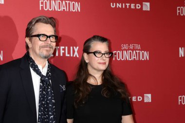 Aktör Gary Oldman ve Gisele Schmidt