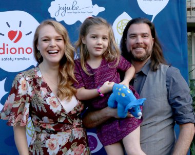Actress Erin Cottrell with family at the Diono Presents A Day of Thanks & Giving at Garland Hotel in North Hollywood, CA