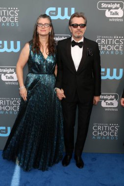 Gisele Schmidt, Gary Oldman 
