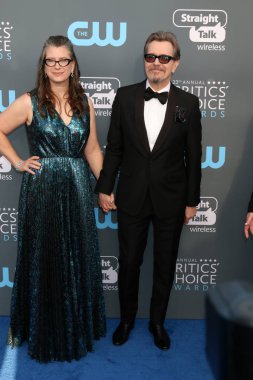 Gisele Schmidt, Gary Oldman 