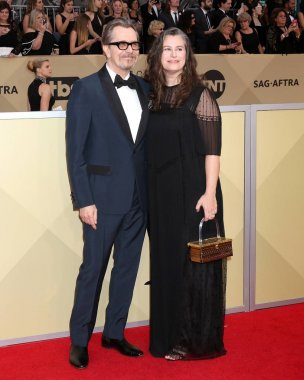 Gary Oldman, Giselle Schmidt