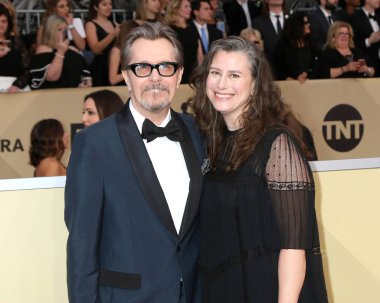Gary Oldman, Giselle Schmidt