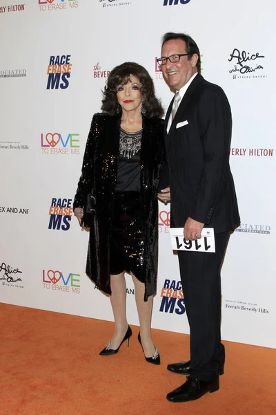 Joan Collins, Percy Gibson — Stock Photo, Image