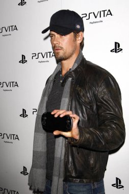 LOS ANGELES - FEB 15:  Josh Duhamel at the Sony PlayStationAE Unveils PS VITA Portable Entertainment System at the Siren Studios on February 15, 2012 in Los Angeles, CA clipart