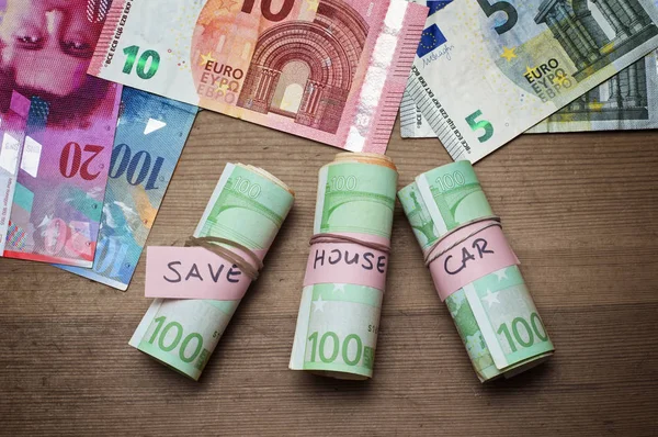 Saving money for house and car concept. Stack of several euro ba — Stock Photo, Image