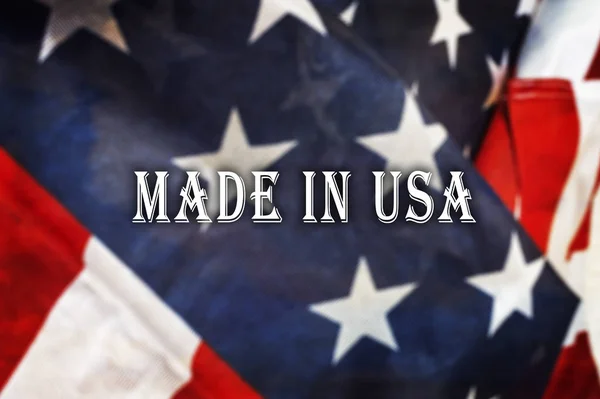 Made in the USA message on USA flag. — Stock Photo, Image