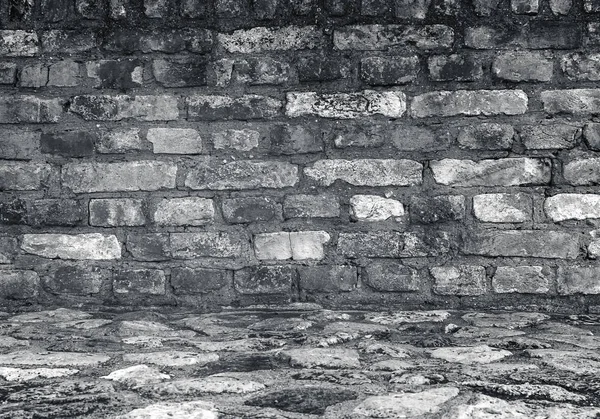 Grungy brick wall and stone floor room as background — Stock Photo, Image