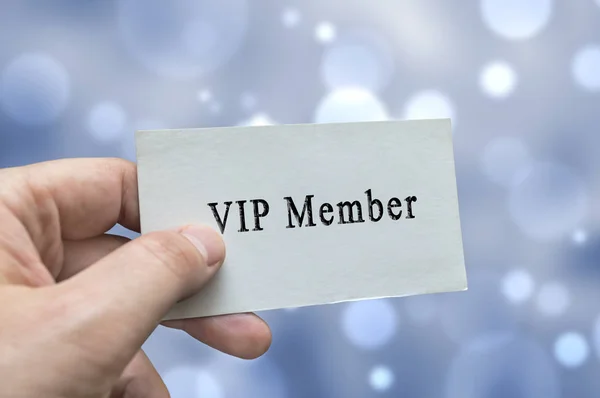 VIP Member card in hand