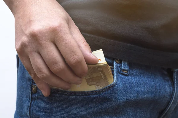 Mettere soldi in tasca — Foto Stock