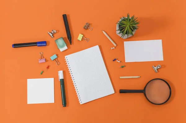 Close up office supplies on orange background — Stock Photo, Image