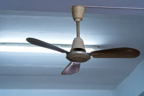 Old ceiling fans Hanging on the ceiling