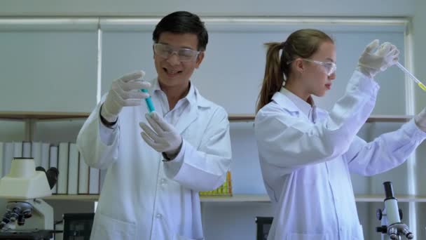 Scientists Helping Research Experiment — Stock Video