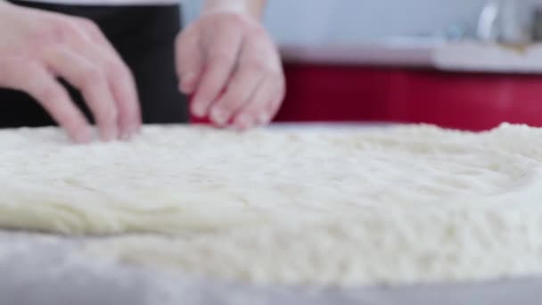 Hands of young man prepare dough close up — Stock Video