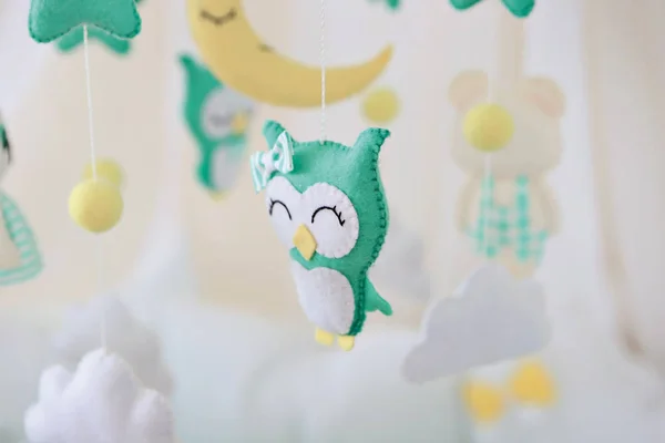 cute owl suspension for a baby cot
