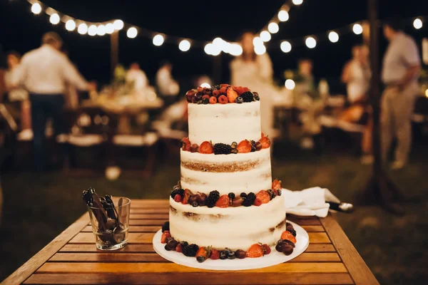 Three-level white wedding cake Stock Photo