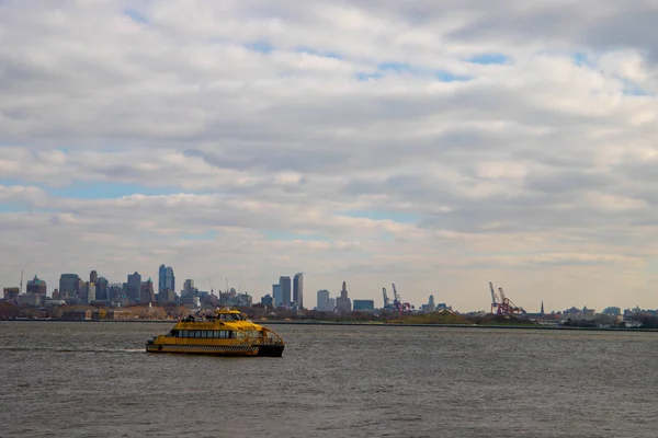Yellow water taxi and New York Skyline , USA. October 11,2018