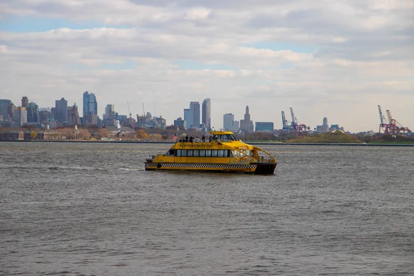 Yellow water taxi and New York Skyline , USA. October 11,2018