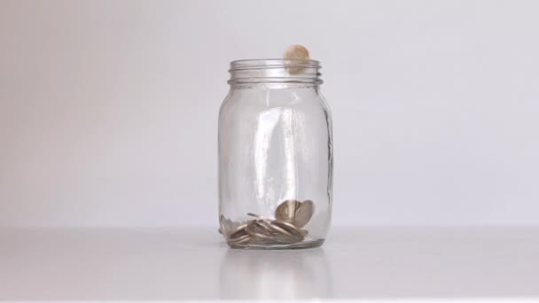 Mexican Coins Filling Bottle — Stock Video