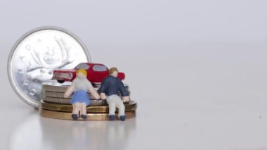 Minyatür Kanadalı aile ve arabaları
