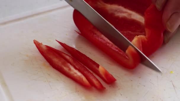 Red Pepper Being Cut Slices Old Woman Hand — Stock Video