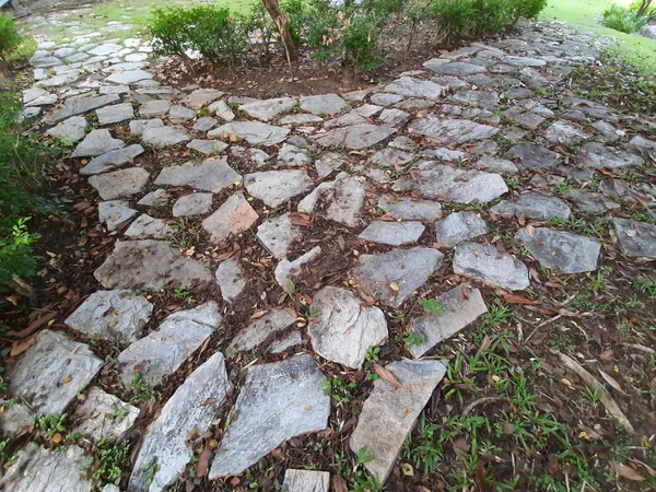 Stone and Leaves walkway texture grunge style background — Stock Photo, Image