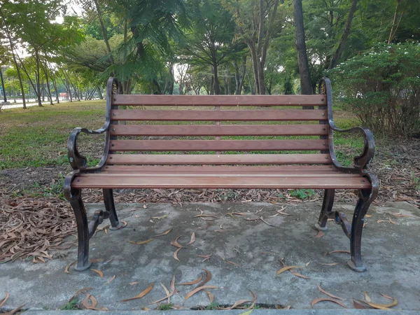 Bench made of weathered wood in warm sunlight — Stock Photo, Image