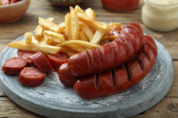 Grilled sausages with chips