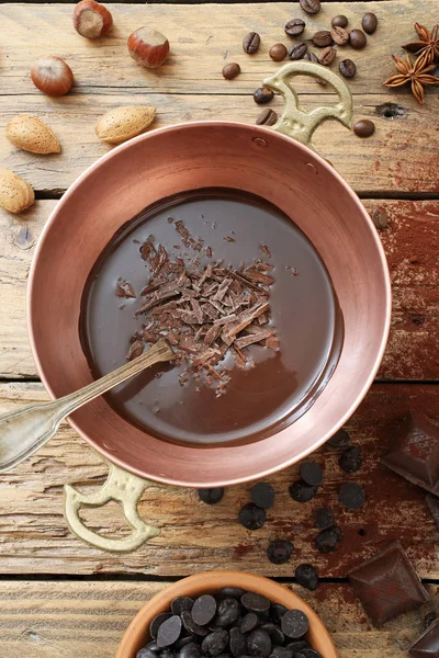 Melted chocolate in metal pan — Stock Photo, Image