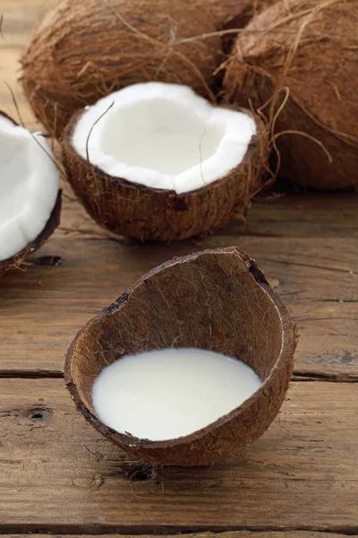 Coconut milk on table — Stock Photo, Image