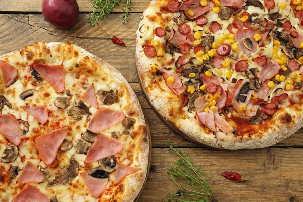 Delicious pizzas with ham — Stock Photo, Image