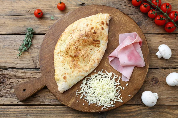 Italian pizza served on wooden table — Stock Photo, Image