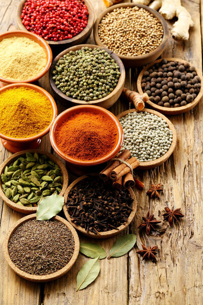 spices assortment on rustic table background